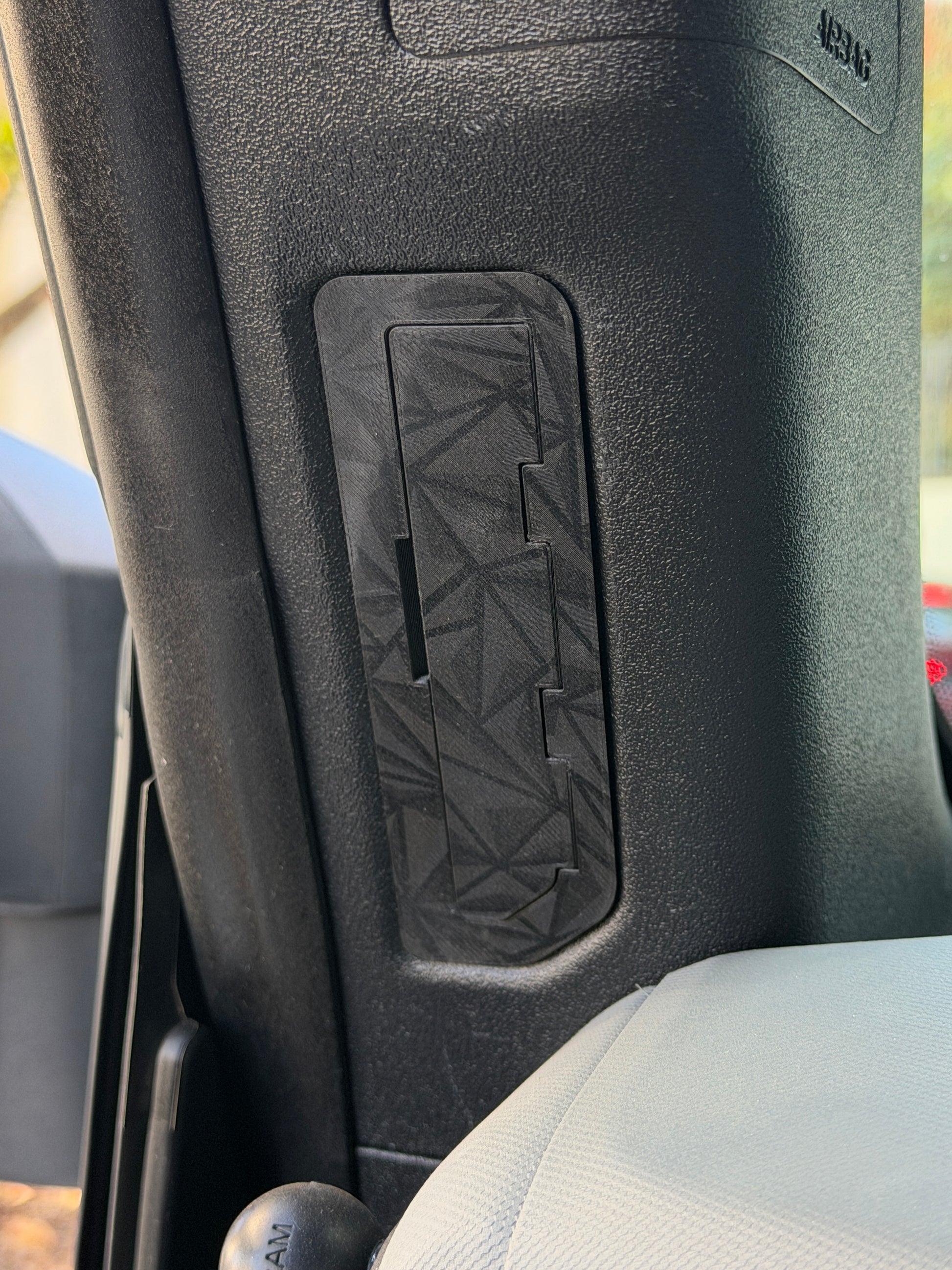 A closeup of the prismatic airlock A-pillar vent