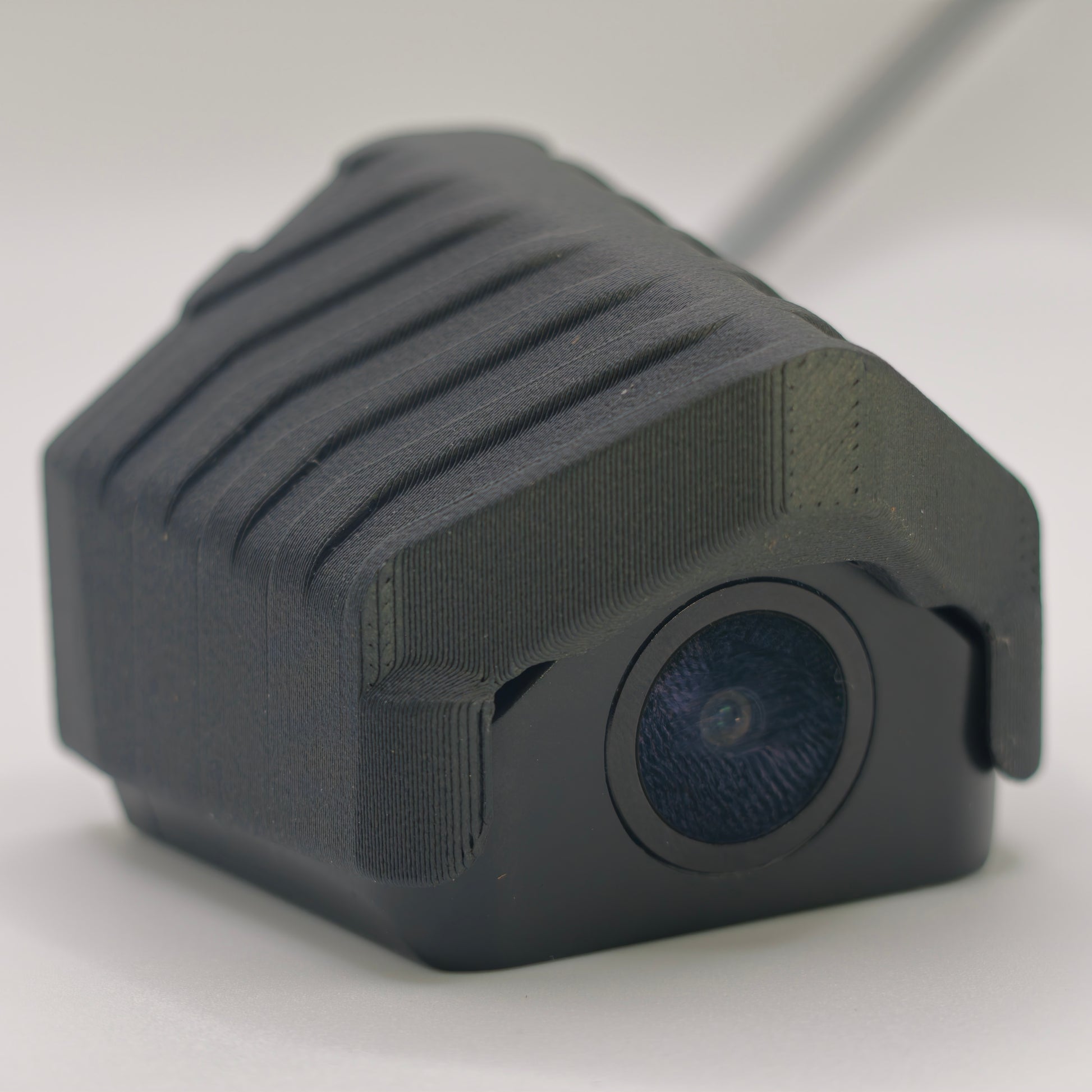 LensJet for Wolfbox shroud with a Wolfbox camera installed, lens facing forward