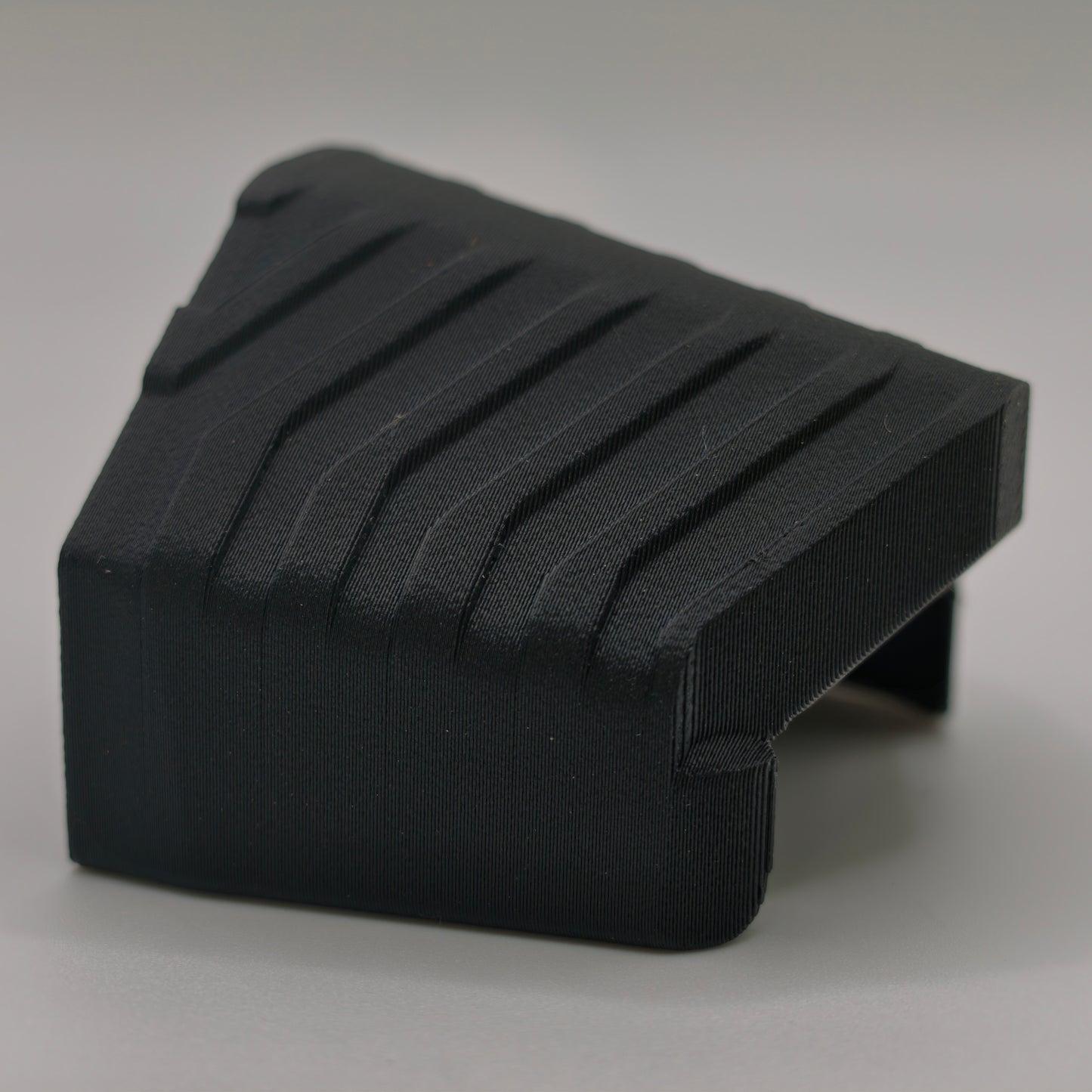 top-view.jpgLensJet for Wolfbox camera shroud made out of black carbon fiber ASA, top view showing the ribbed shell