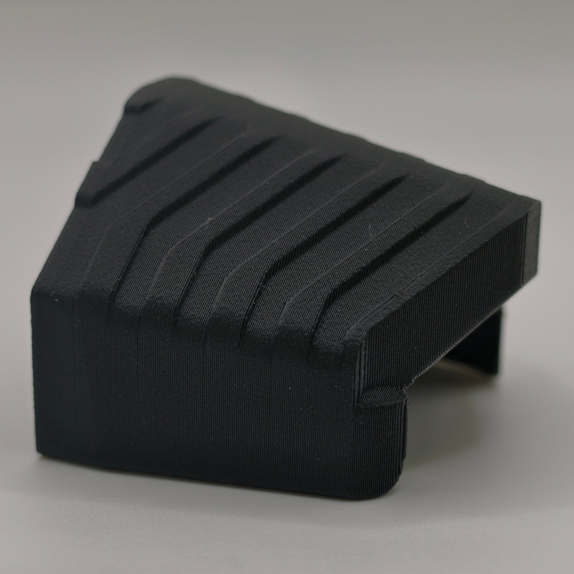 top-view.jpgLensJet for Wolfbox camera shroud made out of black carbon fiber ASA, top view showing the ribbed shell