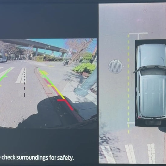 A video demonstrating the LensJet™ camera washer on a Ford Bronco from inside the vehicle on the screen displaying the rear camera view