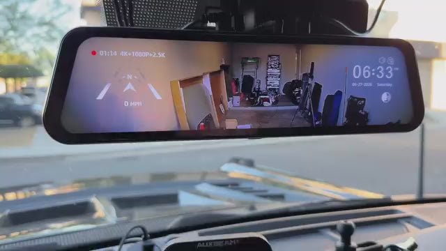 Wolfbox rear view mirror camera feed inside a Ford Bronco showing a clear image after using the LensJet camera washer